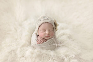 Newborn potato sack pose
