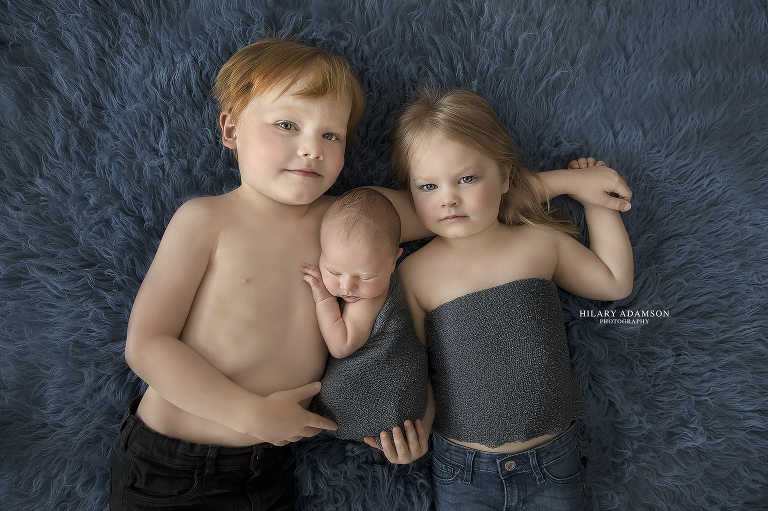 newborn with sibling photo
